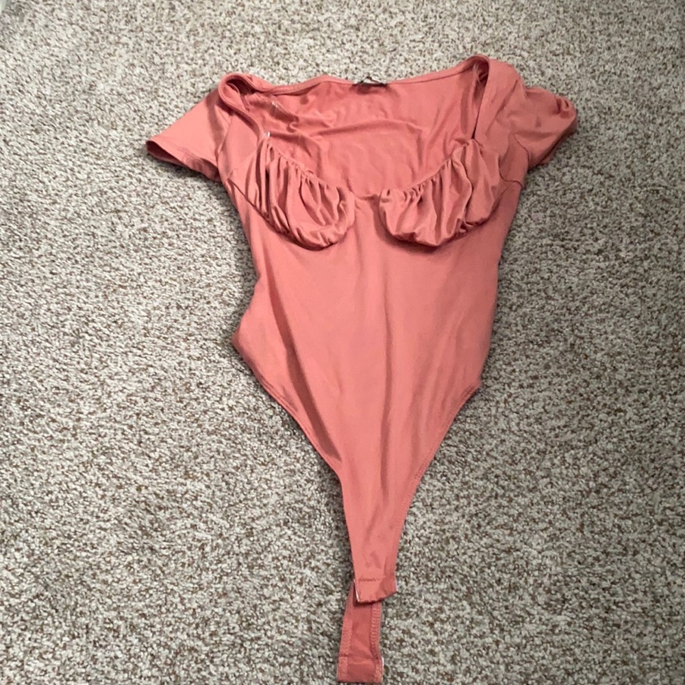 Pink bodysuit